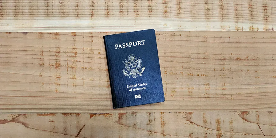 Retiring Abroad in 2025 & 2026 U.S. passport on a desk symbolizing travel and retirement abroad in 2025 and 2026