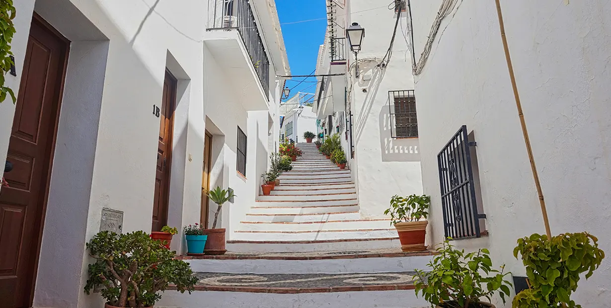 Taxation in Spain for Expats 04 Traditional French house with lavender in the foreground and rolling hills in the background